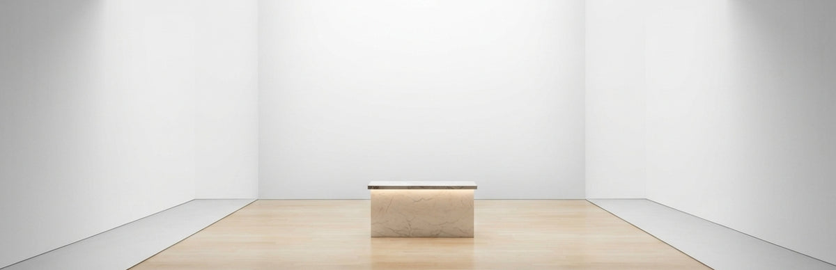 Minimal contemporary gallery interior with a bench